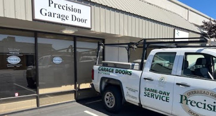 Precision Garage Door Service of Sacramento service truck outside storefront